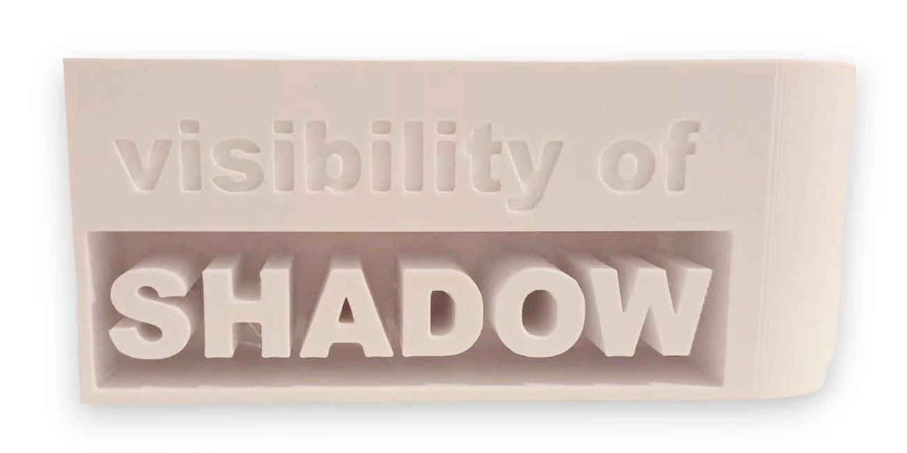 Visible shadow on light color